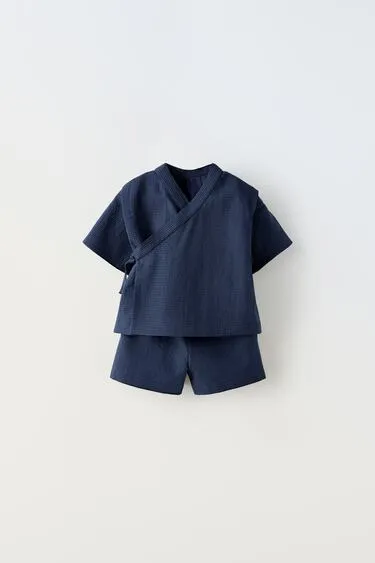 Комплект из шортов и кимоно в клетку виши