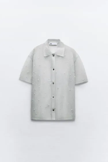Рубашка из полупрозрачного трикотажа с бусинами