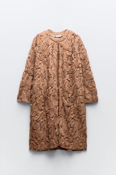 Пальто из рельефной ткани с бусинами